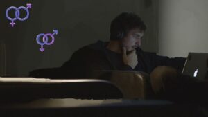 8 Effects of pornography, sex trafficking, and child porn 9 A man in a black sweater watching pornography secretly in his room using a laptop