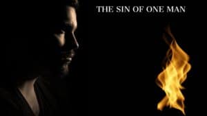 a man in black looking at the fire regretting over the sin of one man